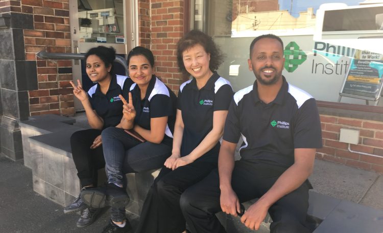 happy cert 3 psa training course phillips institute students sitting outside the carnegie building